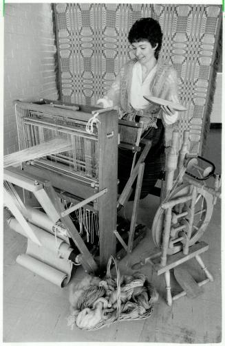 At the loom: Joan Bowman, of the Etobicoke Handweavers and Spinners Guild, operates a 22-inch jack loom