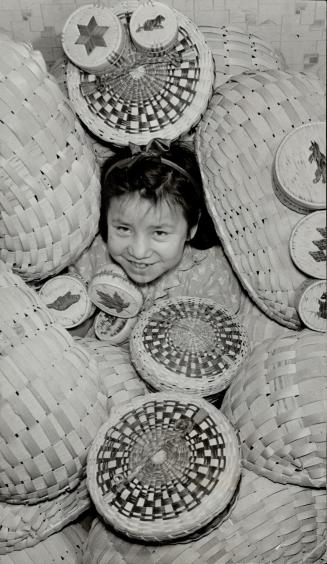 Fine baskets like these are an important item in the reserve's cash income and the department of Indian affairs finances the sale of them. The smaller(...)