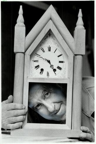 A special character: Wim Pattenden peers through the pendulum box of an unfinished clock