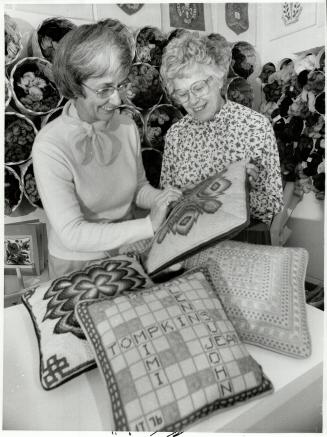 Hobby pays off: Jean Tompkins (right) inspects products at Nimble Thimble with assistant, Christine Charles