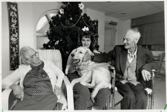 Best friend: Florence Reed and Doug Osborne greet Honey and Fairview Lodge employee Heather Tim