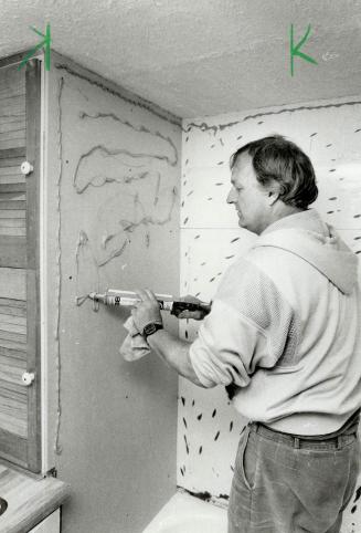 Caulking technique: Above, use caulking gun to apply adhesive supplied with unit