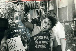 An 11-year-old Boy, Billy, Martin, was among the demonstrators who chained themselves in a house on Bleecker St