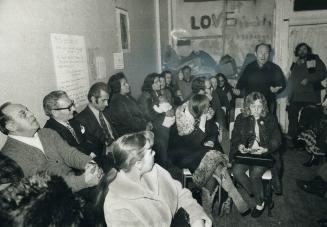 Meeting their landlord, George Herezeg, at right, who gestures as he talks with them, tenants of the homes on Wilkins Ave. that he owns listen to his (...)