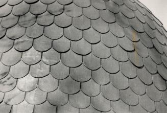 Varied types: Among the more exotic styles of roof covering available in Metro are (from left) cedar shakes, copper roofing, English slate and standard roofing slate