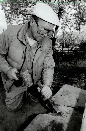 Chipping away: Fred Maycock of Walder and McSweeney repairs a cracked stair and helps chisel down a homeowner's list of repair jobs that need doing