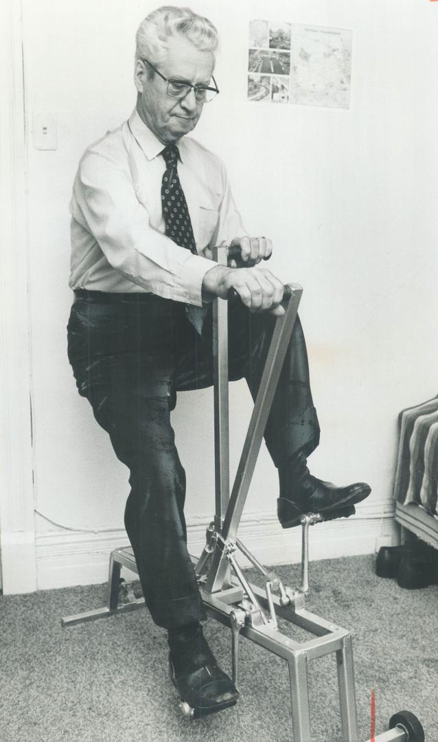 Inventor and former prospector Henry Charbonneau, 78, demonstrates the exercise bicycle he developed that helps both arms and legs. He's hoping to find a manufacturer