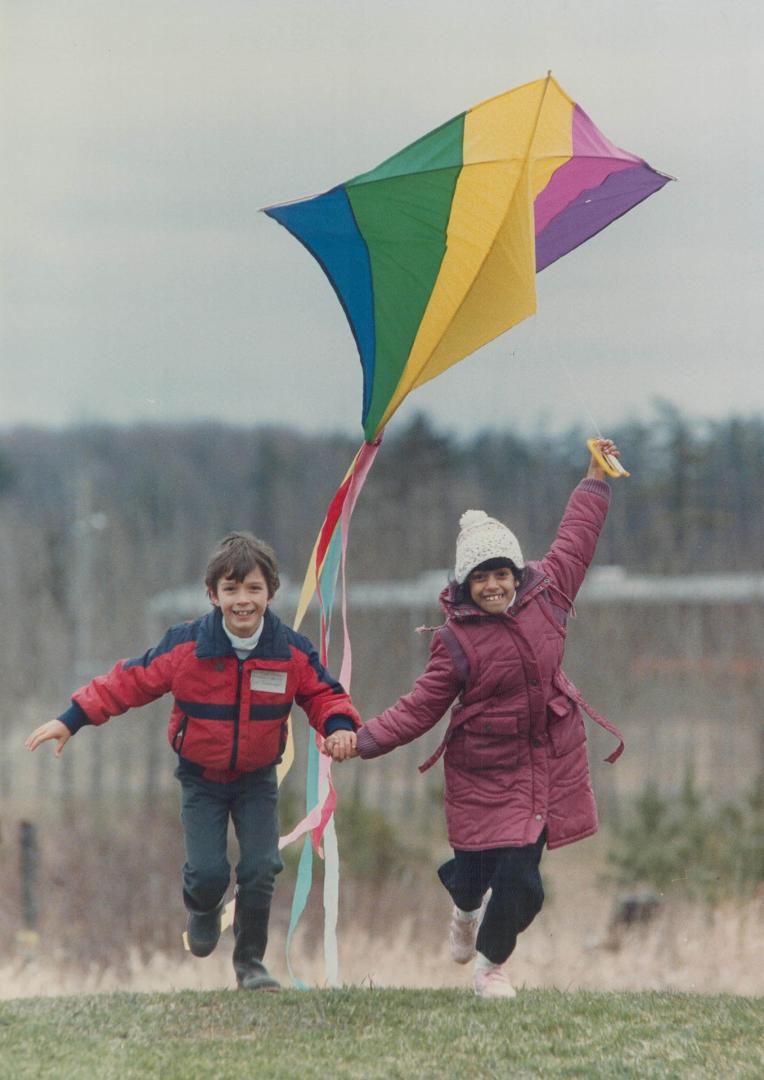 They delight in flying a kite, Ryan Stananought and Sarah Habib, both 7,  test their skills at kite flying before Saturday and Sunday's Four Winds  Kite(...) – All Items – Digital Archive :