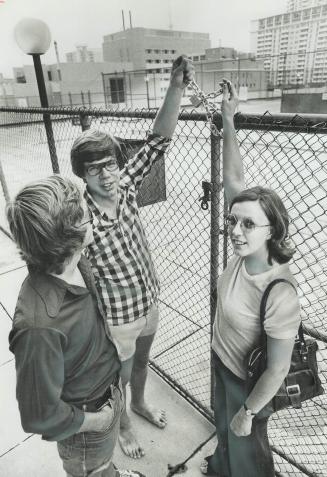 They couldn't complain to the foreign landlords when their recreation facilities were restricted, so tenants locked the pool open. From left, Robert Mitchell, Carl Cedarburg and Diane Nowicki