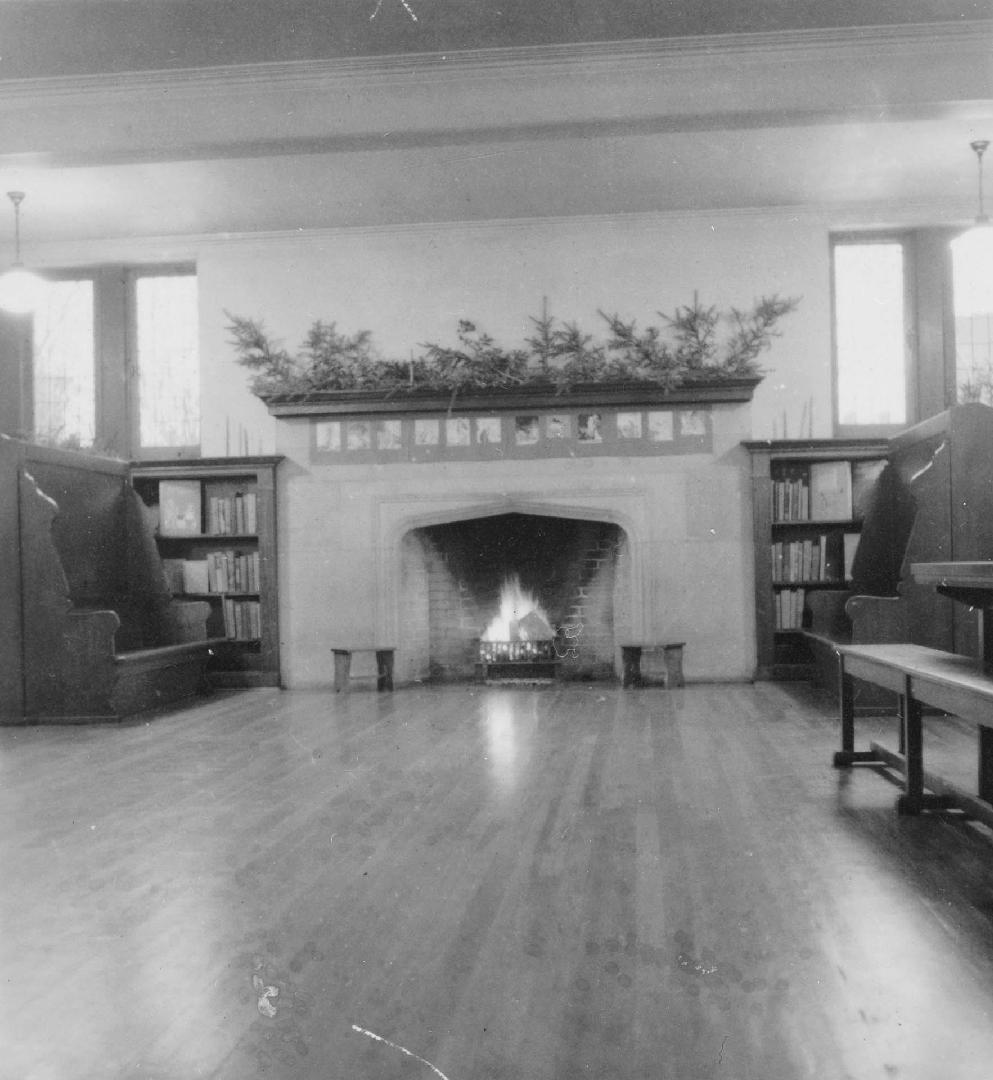Image shows the fireplace in the Boys and Girls Room at the library. 