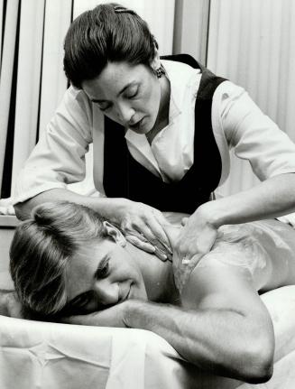 Lap of luxury: Above, masseuse Katherine Hardy of Alanna V gives relaxing massage