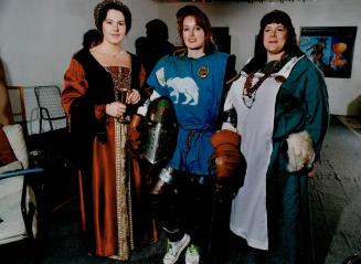 Below right, medieval ladles, left to right, Sarah Hughes, Linda Watters and Mia Crission, relax