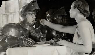 The Tin Suit is cute, but iron sleeves heavy - she's got to feed the brute!