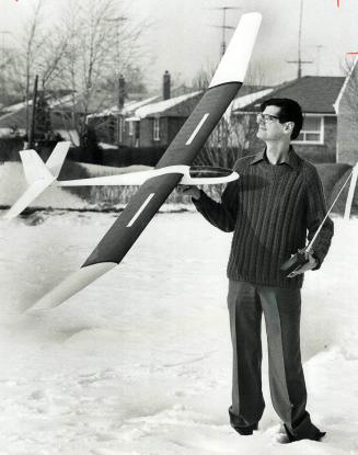 Getting Ready for the first world championship for radio-controlled soaring, Jack Humphreys checks out his glider near his home. He will be one of Can(...)