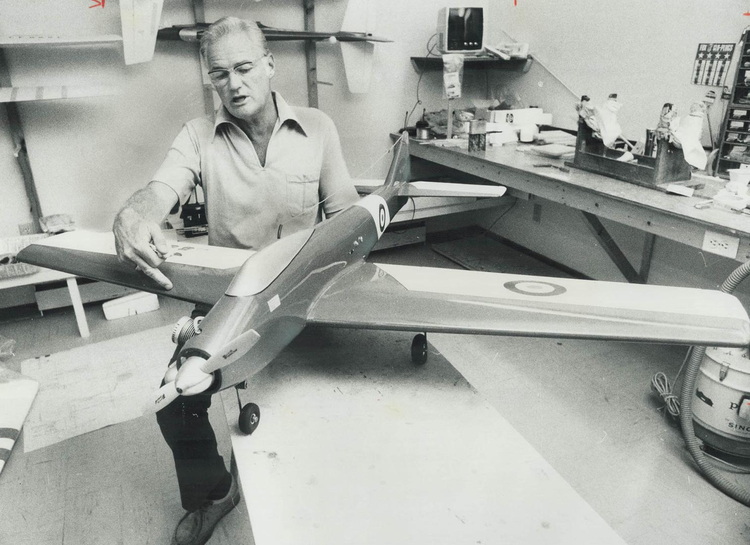 Model Airplane enthusiast Warren Hitchcox of Oakville checks out a radio-controlled craft he built in a workshop in his home. Hitchcox and about 75 ot(...)