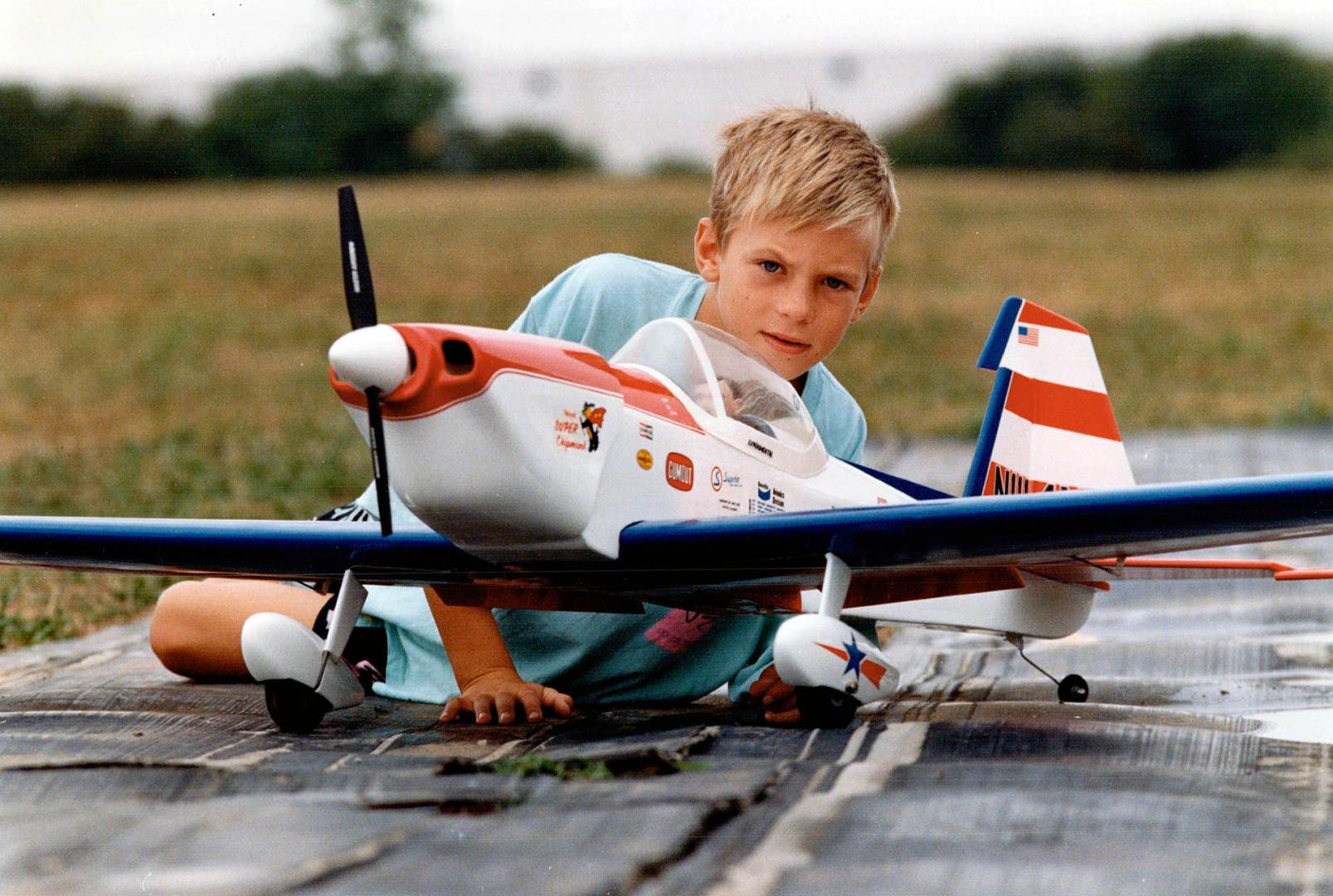Ryan Hughes of Ajax displays a Super Chipmunk model airplane that he and other members of his family fly