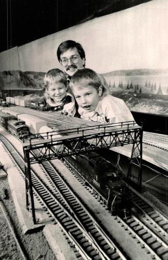 Little Choo-Choo: Les Radvanyl and his sons, Ben, 5, and Matthew, 7, check out the choo-choos at the Delaware & Rutland railroad modellers' clubhouse in Weston