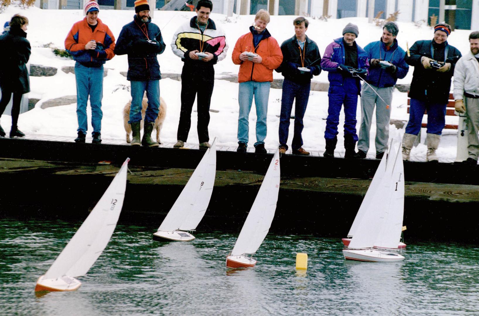 While most big sailboats are still in storage, this group of sailors stand on shore at the Lakefront Promenade in Mississauga and control little model(...)
