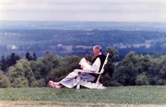Right, Father Justin Guibord enjoys the peace of the countryside surrounding Hockley Heights