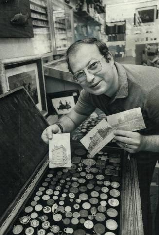 Willowdale man collects the past, Larry Becker, 34, of Willowdale holds some of his 5,000 postcards of old Toronto