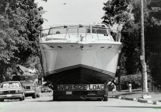 Hull Of An Understatement, Trailers bearing huge boats are common during the summer on the streets leading to Frenchman's Bay in Pickering. But his ov(...)