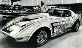 Custom Paints Job on this 1971 Corvette is admired by Colleen Cariou at the Toronto International Centre