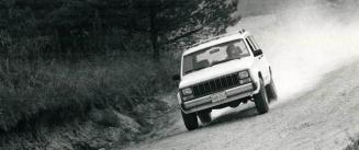 One of Wheels' road-test tires takes a turn on the dirt paths around Mosport Park