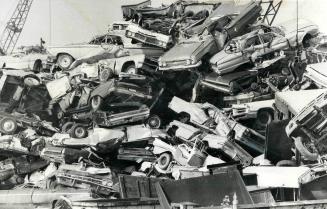 Price of Automotive junk soars to $100 a Ton, This heap of junked cars on the Cherry St