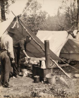 Nipigon 10966 [men cooking at camp]