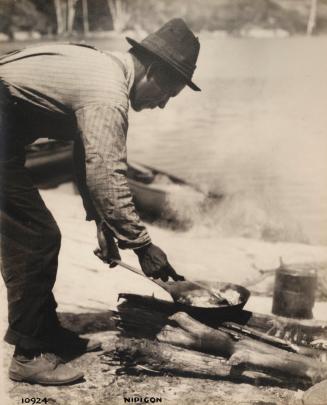 Nipigon 10924 [men cooking at camp]