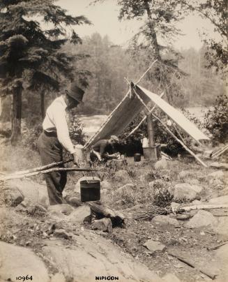 Nipigon 10964-2 [men cooking at camp]
