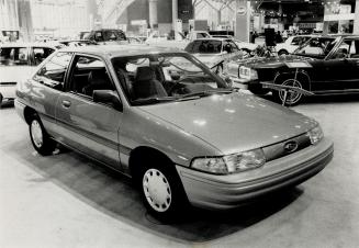 1990 Escort prices are listed, but 1991 (pictured) will replace current model