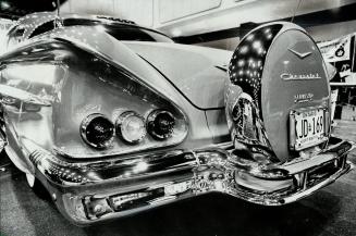 Tender Loving Care is shown in the detail of this specially chromed and customized rear end of a 1958 Chevrolet Impala