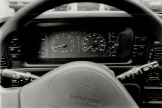 Inside story: The Sonata dashboard looked substantial with White-on-black instruments but the rear-view mirror on the V-6 wobbled