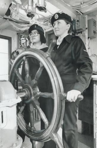 Joyce Nakagawa keeps watch with Jeannie Lowe at wheel, However, she and a halfdozen other women reservists were all set to go to sea during the week(...)