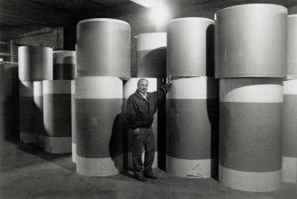 Tall order: Archie flora, mill manager at Atlantic Packaging in Whitby, with rolls of newsprint