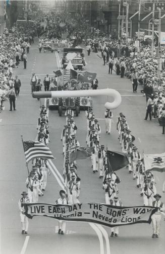 Down yonge street parade members of the California-Nevada Lions in a pageant which drew a crowd estimated by police as close to 250,000 along its two-(...)