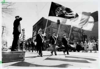 Saluting a proud memory: Toronto's naval community parades downtown yesterday to honor Canadians who served and died in the Battle of the Atlantic