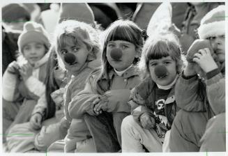 Junior Rudolphs: Red foam noses, sold by nurses from Sunnybrook Health Science Centre, were the hit of the day with many of the children lining the streets