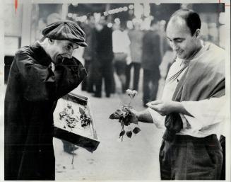 Man buying flowers was part of a layout entitled Yonge St