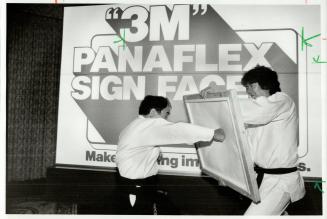 Breakthrough, 3M Canada Inc. thinks it's new Panaflex material for outdoor plastic signs is a breakthrough, but karate expert Tominaga found the mater(...)