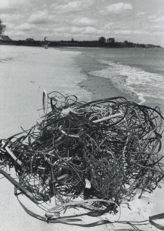 Tangled metal litters the scene on beach at woodbine, City officials blame the conditions on three days of high winds