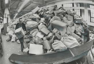 Bags of mail piled up at Terminal A during the mail holdup caused by the Public Service Alliance picket lines