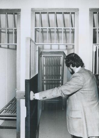 Jail cell Where 20-year-old Donald Raaflaub was found hanged Sept, 5 is opened by Richard Fleming, a correctional services officer, when an inquest ju(...)