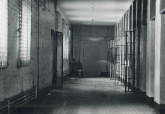 Last walk leads to door on left, opening into execution drop area in the Don Jail