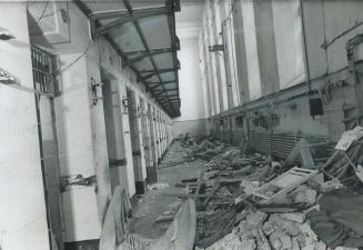 Tons of rubble torn from cells and walls lie at the bottom of one of the cell ranges at Kingston Penitentiary, where 500 rioting prisoners were in con(...)