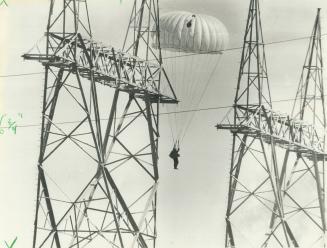 One of five protesting parachutists floats down on to Darlington nuclear plant site