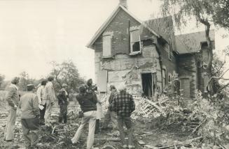Bulldozers attack house on Pickering airport site today while two members of anti-airport movement were inside