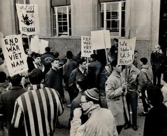Pro and anti-U.S. groups mingle at U.S. consulate, Varsity students came close to brawling over American raids on Viet Nam