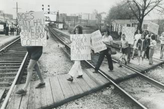 Mothers demand a safe crossing, Mothers who claim this railway crossing on Osler St